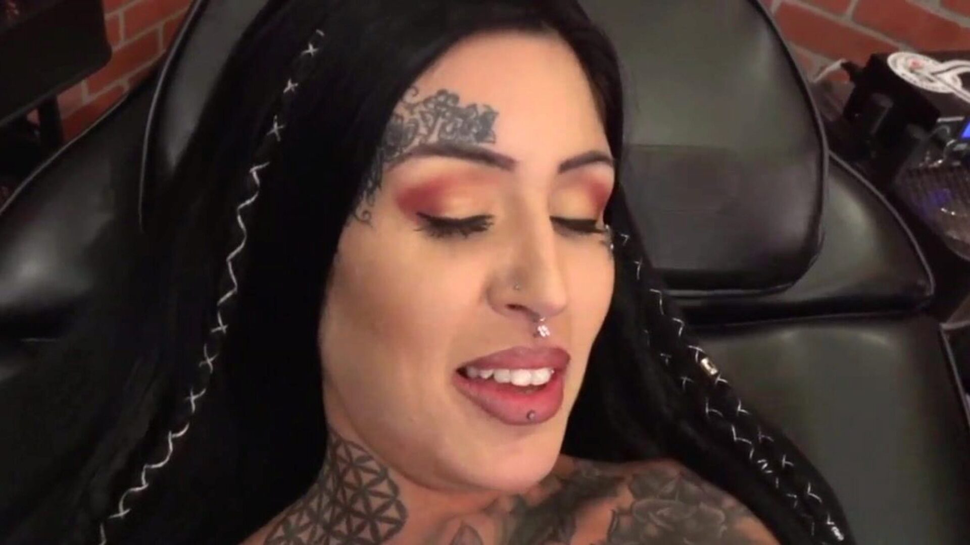 Beautiful hottie Janey Doe has her large hooter tattooed