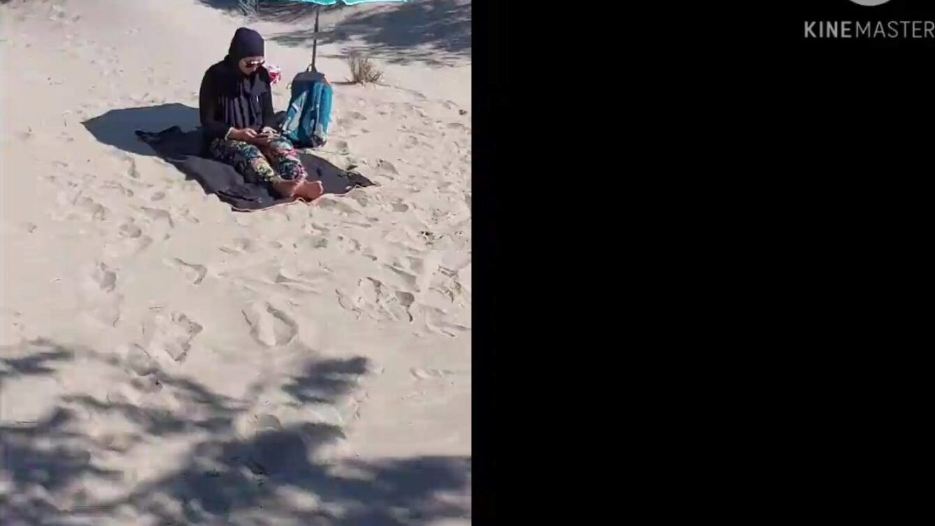 I perplexed this muslim by pulling my ramrod out on the public beach, OMG her husband will be here in a short time