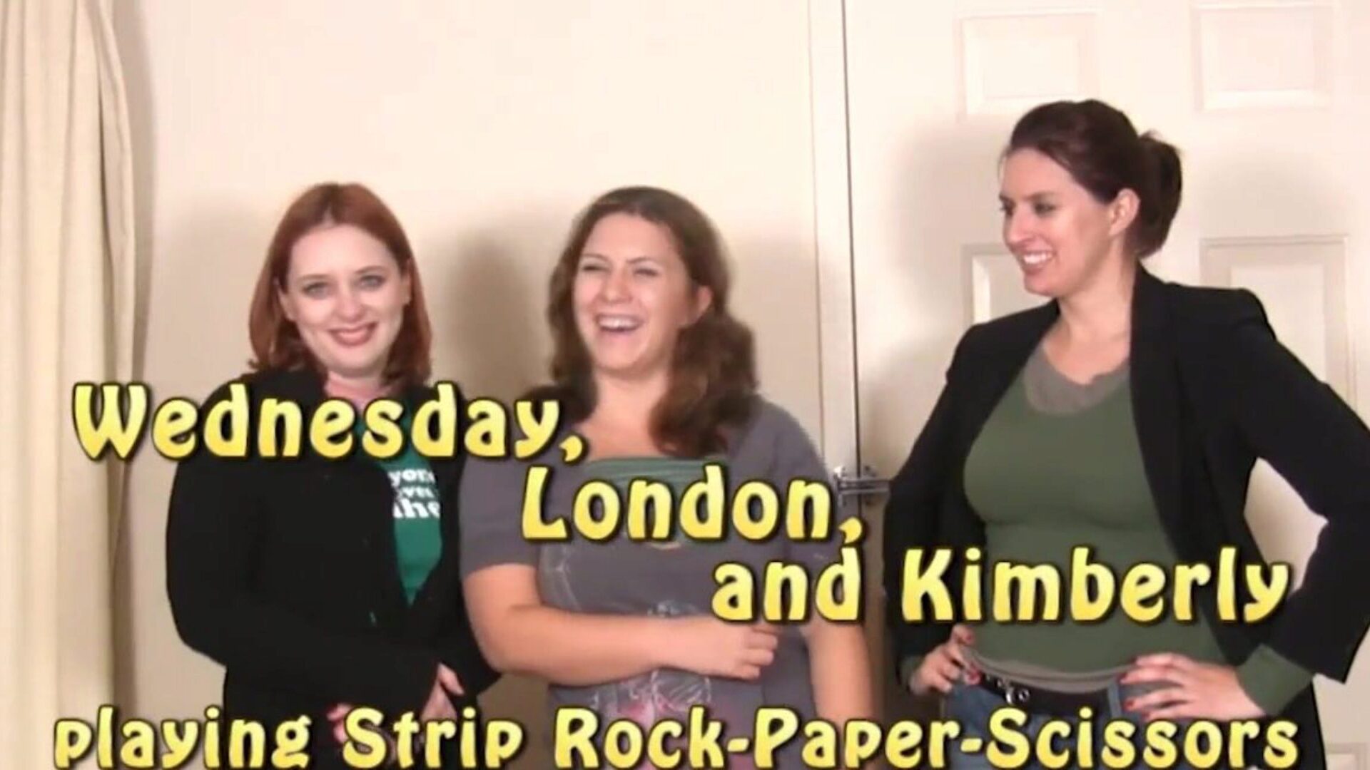 Group Of People Play A Game Of Strip Rock Paper Scissors