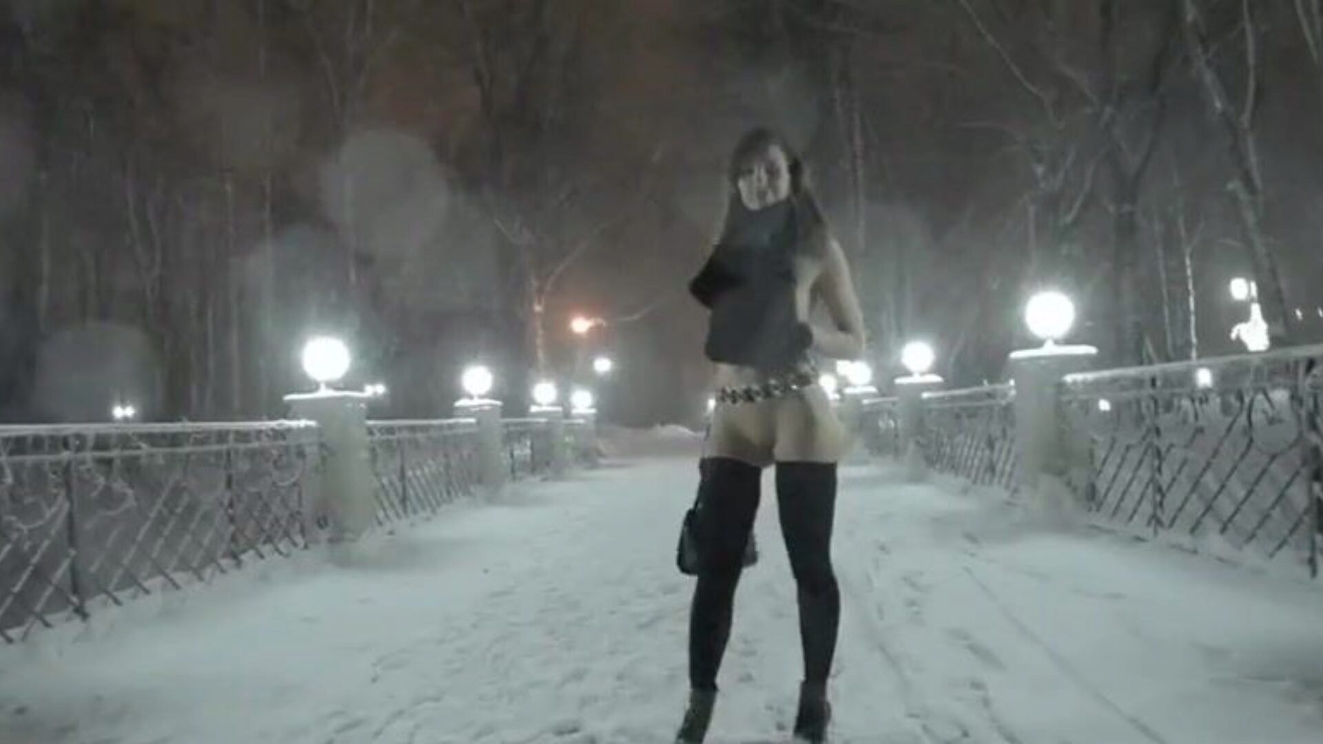 Jeny Smith naked in snow fall walking throughout the town