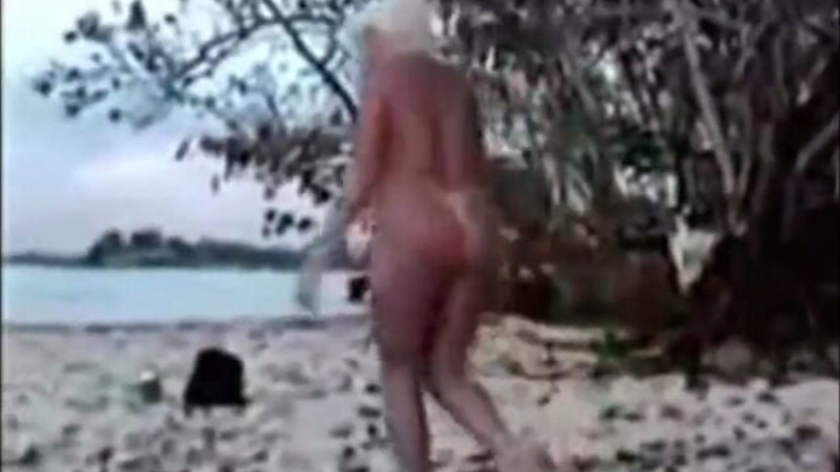 jamaica beach - blond tourist has a supah plumb