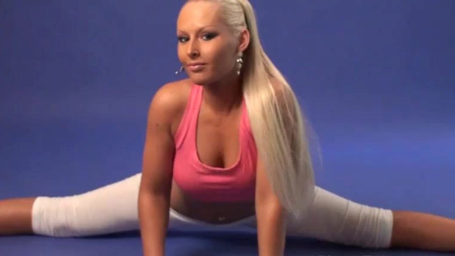 Cute blond demonstrates exposed gymnastics